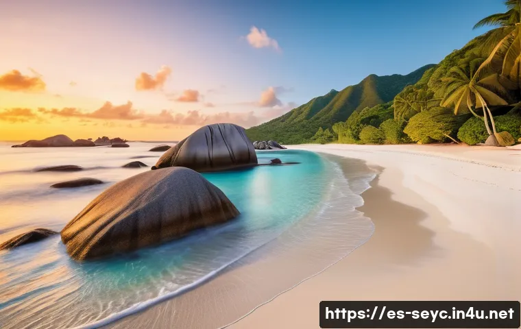 세이셸 사진 찍기 좋은 장소 - A breathtaking sunrise scene at Anse Source d&rsquo;Argent beach in Seychelles, featuring pristine white s...